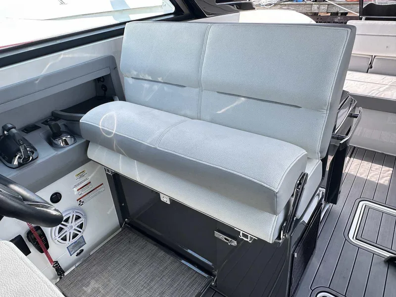 Slide: The Image of 2019 Cobalt A36 boat interior with plush seating and modern controls. - 18