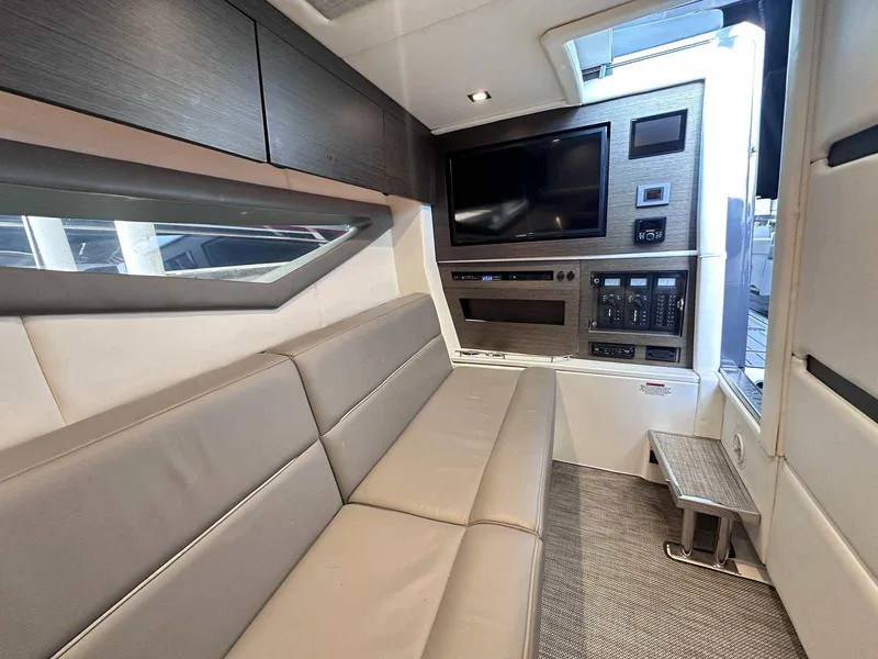 Slide: The Image of Luxurious interior of 2019 Cobalt A36 boat with modern seating and entertainment system. - 34