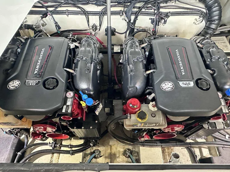 Slide: The Image of Twin Volvo Penta engines in a 2019 Cobalt A36 boat engine compartment. - 36