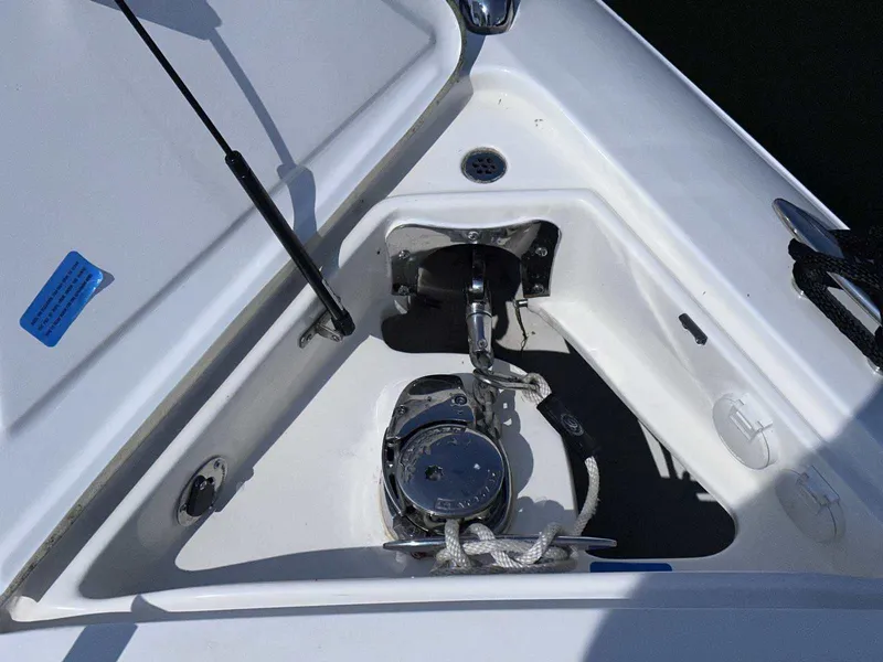 Slide: The Image of Anchor compartment of 2019 Cobalt A36 boat with winch and rope. - 5