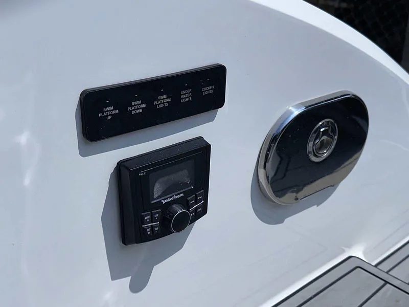 Slide: The Image of Control panel on a 2019 Cobalt A36 boat with various function buttons. - 7