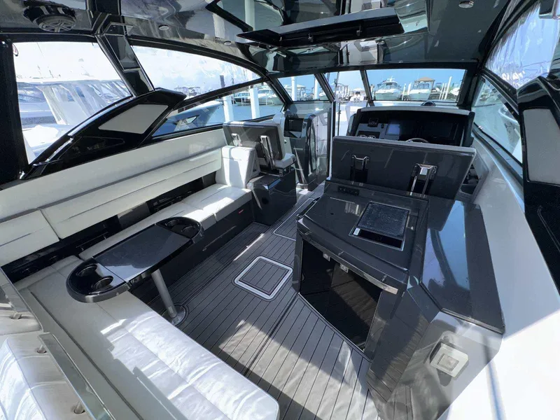 Slide: The Image of Luxurious interior of a 2019 Cobalt A36 yacht with sleek seating and modern amenities. - 8