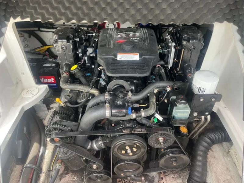 Slide: The Image of Engine compartment of a 2007 Crownline 220 EX boat, featuring a MerCruiser MPI engine. - 10