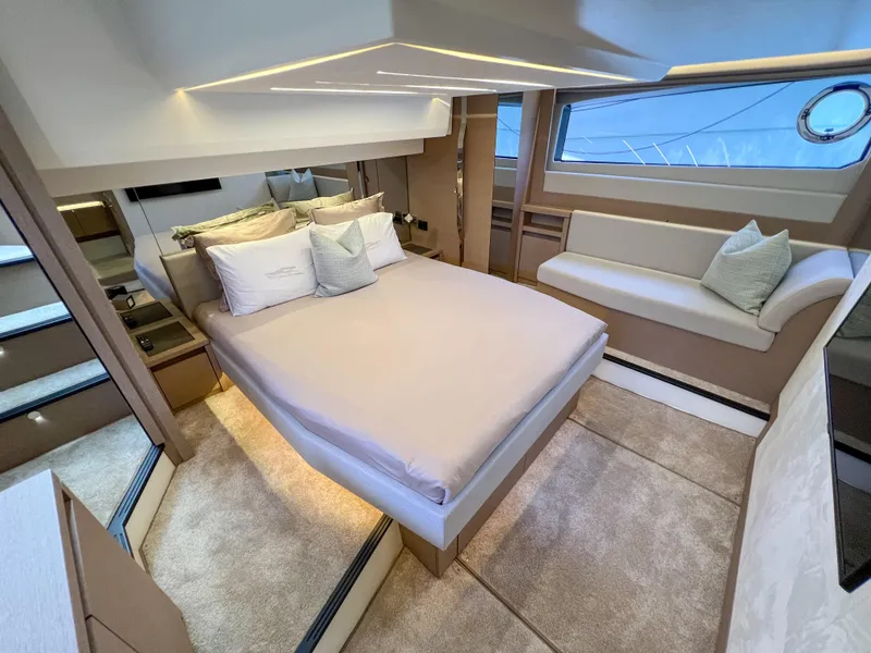 Slide: The Image of Luxurious interior of a 2020 Prestige 520S yacht with modern bedroom design. - 14