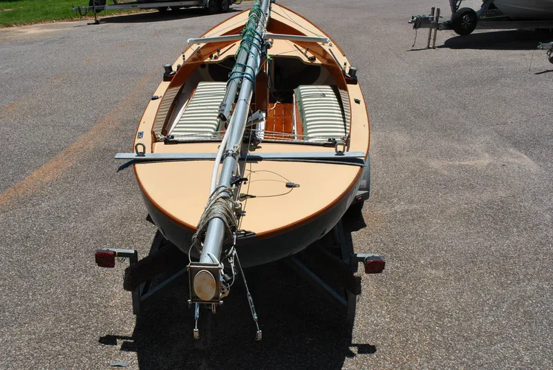 Slide: The Image of 2006 Edey & Duff Sakonnet 23 sailboat on trailer, mast secured, parked on asphalt. - 10