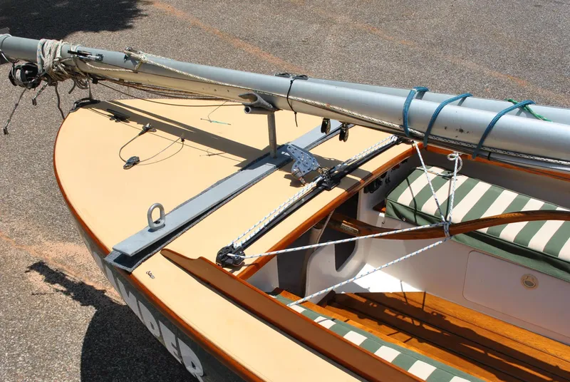 Slide: The Image of 2006 Edey & Duff Sakonnet 23 sailboat with striped cushions and rigging details. - 13