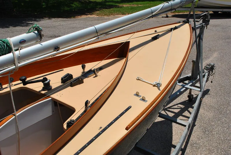 Slide: The Image of 2006 Edey & Duff Sakonnet 23 sailboat on trailer, showcasing deck and rigging details. - 14