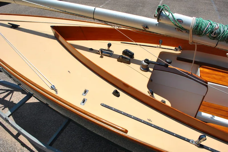 Slide: The Image of 2006 Edey & Duff Sakonnet 23 sailboat deck with rigging and wooden accents. - 20
