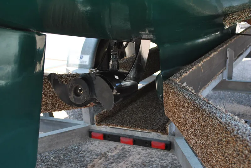 Slide: The Image of Close-up of a 2006 Edey & Duff Sakonnet 23 boat propeller on a trailer. - 24