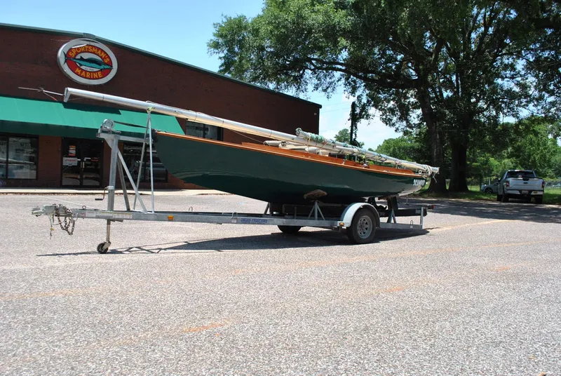 Slide: The Image of 2006 Edey & Duff Sakonnet 23 sailboat on trailer outside Sportsman's Marine. - 7