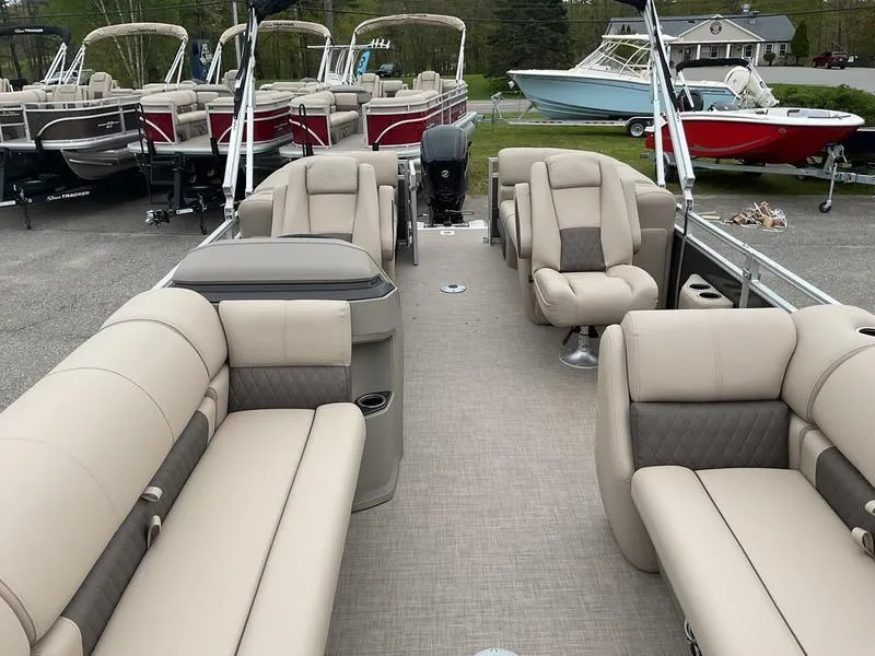 Slide: The Image of 2025 Sun Tracker PARTY BARGE® 22 DLX pontoon boat with spacious seating and modern design. - 10