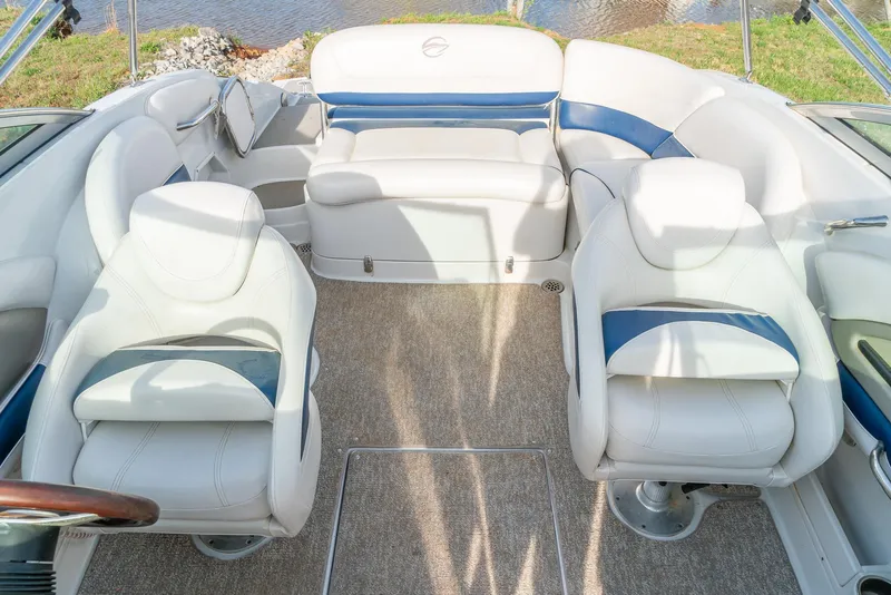 Slide: The Image of 2012 Crownline Eclipse E2 boat interior with white and blue seating. - 20
