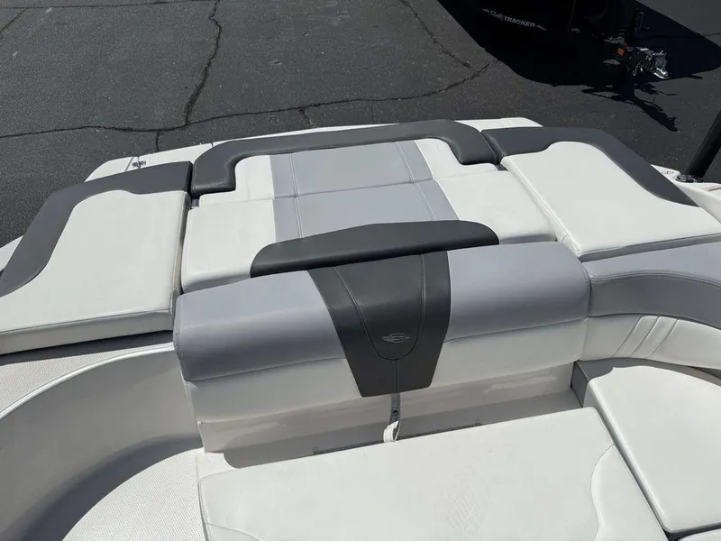 Slide: The Image of 2022 Chaparral 23 SSi boat interior with sleek, modern seating design. - 24