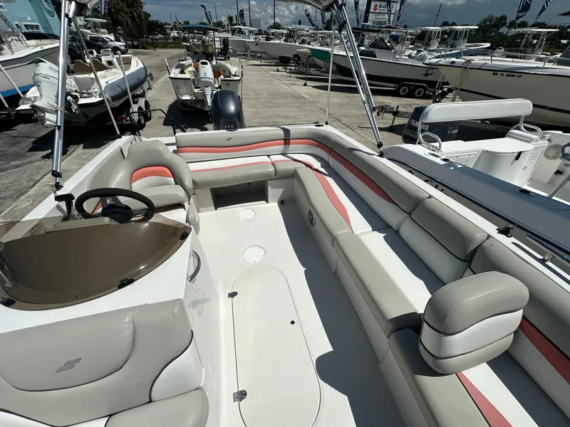 Slide: The Image of 2017 Starcraft MDX 191 OB boat interior with spacious seating and steering console. - 6