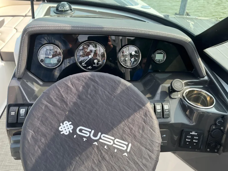 Slide: The Image of Dashboard of a 2021 Monterey M6 boat with Gussi Italia steering wheel cover. - 5