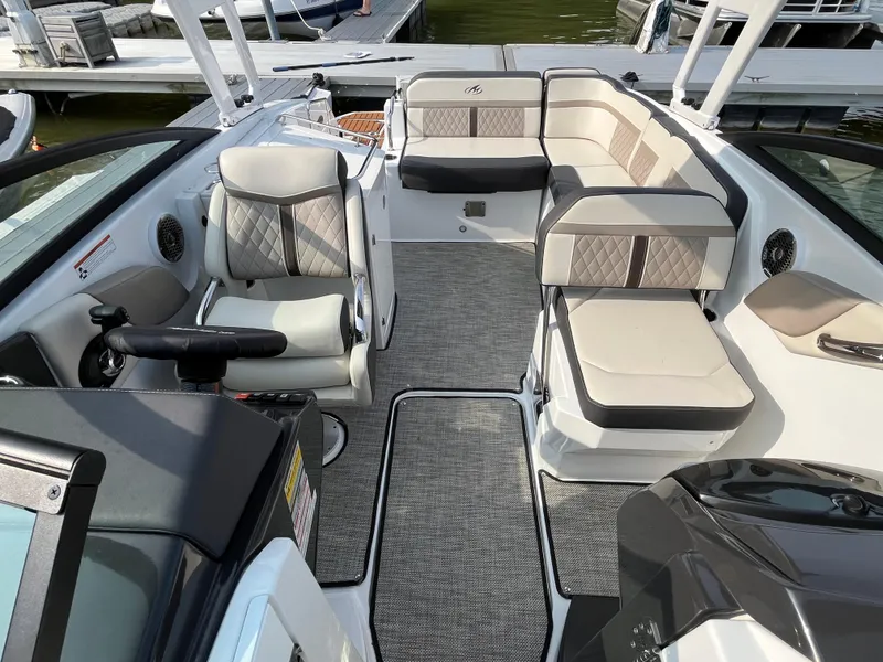 Slide: The Image of Interior of a 2021 Monterey M6 boat with luxurious seating and modern design. - 8