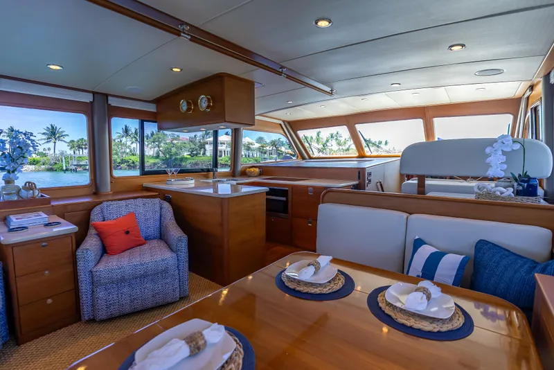 Slide: The Image of Luxurious 2018 Grand Banks GB60 yacht interior with elegant seating and dining area. - 37