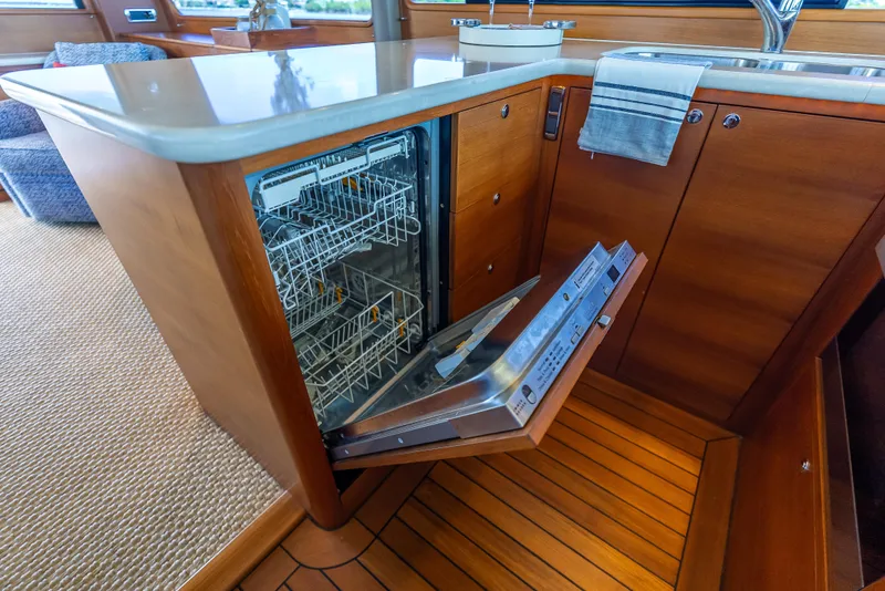 Slide: The Image of Luxury yacht kitchen with open dishwasher, Grand Banks GB60, 2018 model. - 45