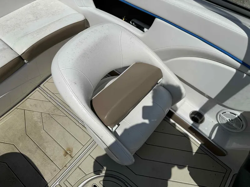 Slide: The Image of 2008 Four Winns 200 Horizon boat interior with white and brown seating. - 13