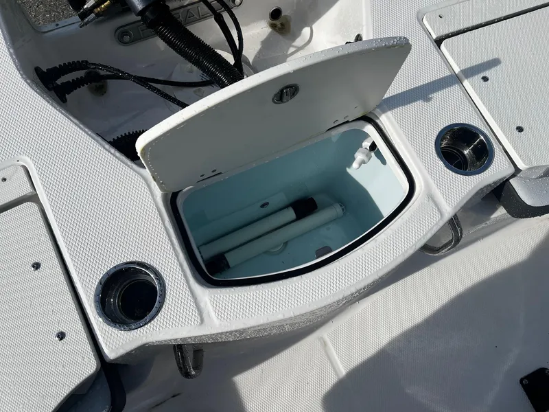 Slide: The Image of Open storage compartment on 2025 Robalo 206 Cayman boat deck. - 15