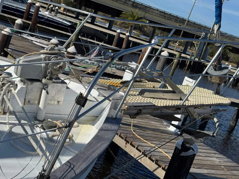 Slide: The Image of 1983 Island Trader Motor Sailor docked, showcasing deck and rigging details. - 3