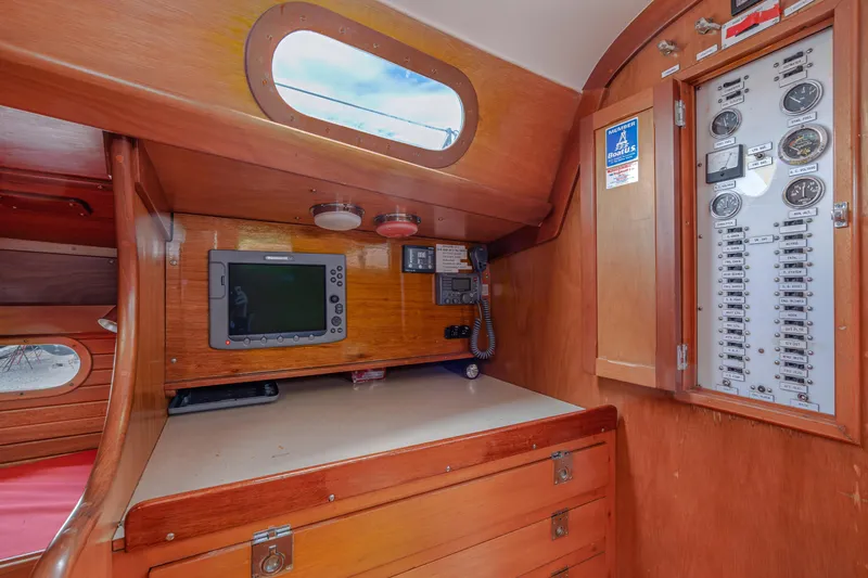 Slide: The Image of Interior of 1972 Hinckley 48 sailboat with navigation equipment and control panel. - 32