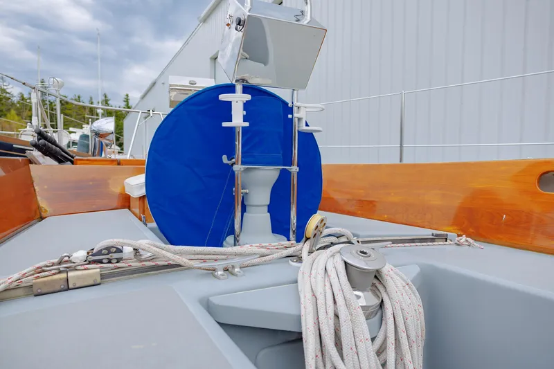 Slide: The Image of Hinckley 48 sailboat deck with ropes and equipment, 1972 model. - 19