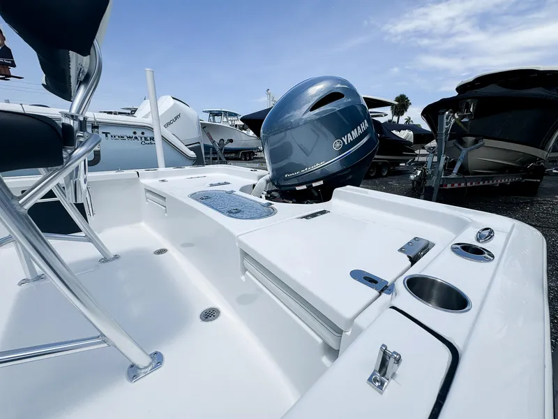 Slide: The Image of 2026 Tidewater 1910 Bay Max boat with Yamaha engine, docked outdoors. - 7
