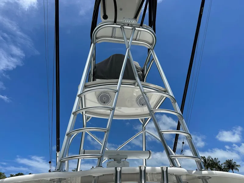 Slide: The Image of 2018 SeaVee 390Z boat tower against a clear blue sky. - 13