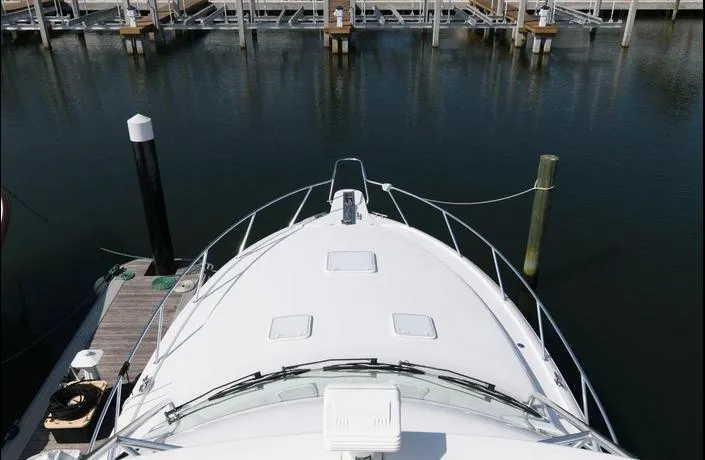 Slide: The Image of 2015 Hatteras 45 Express Sportfish docked at marina, aerial view. - 26
