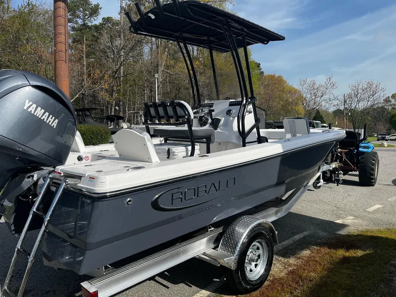 Slide: The Image of 2025 Robalo 206 Cayman boat with Yamaha engine on trailer. - 11