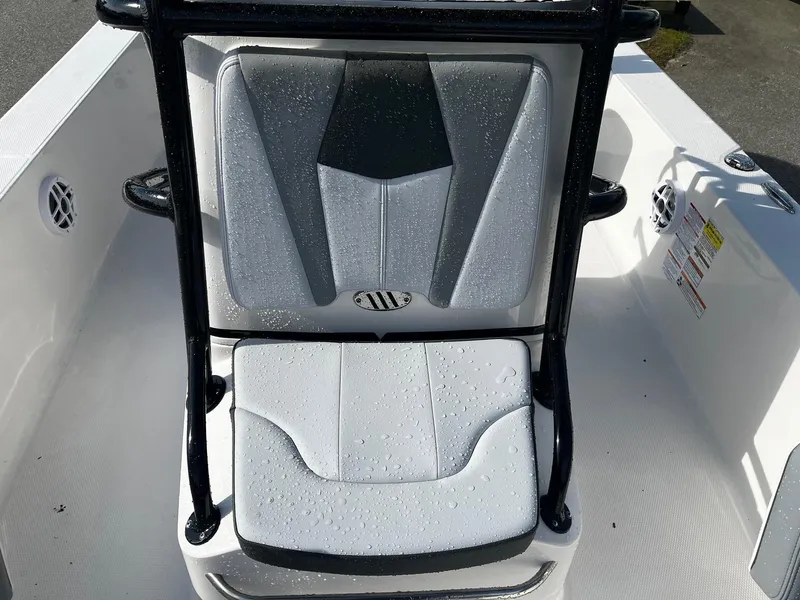 Slide: The Image of 2025 Robalo 206 Cayman boat seat with water droplets, showcasing sleek design and comfort. - 20