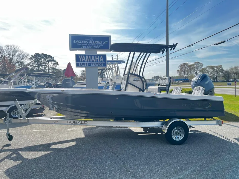 Slide: The Image of 2025 Robalo 206 Cayman boat on trailer at Angler's Marine NC dealership. - 8