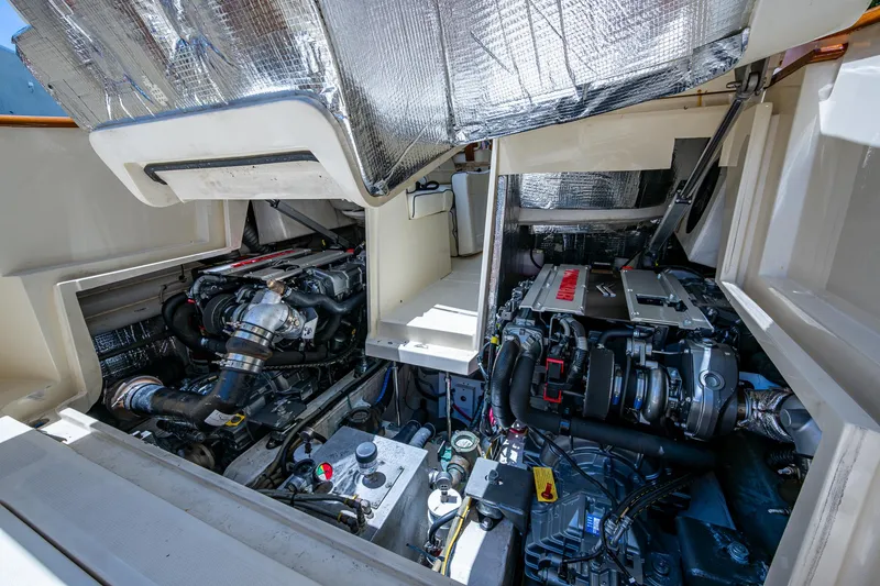 Slide: The Image of Engine compartment of a 2016 Hinckley Talaria 34, showcasing dual engines and components. - 17