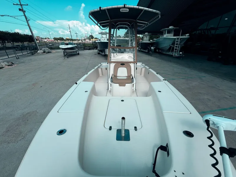 Slide: The Image of 2014 Scout WINYAH BAY 221 boat, white deck, outdoor display, clear sky background. - 11