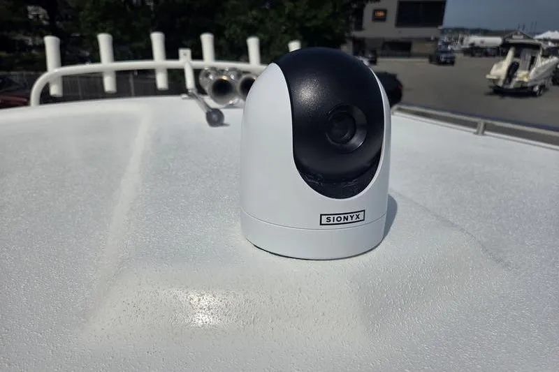 Slide: The Image of SIONYX camera on 2025 Parker 2820 XLD boat deck, marina background. - 4