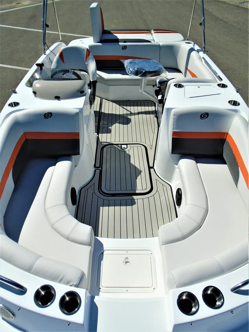 Slide: The Image of 2019 Hurricane SS188 boat interior with white and orange seating, spacious layout, and modern design. - 9