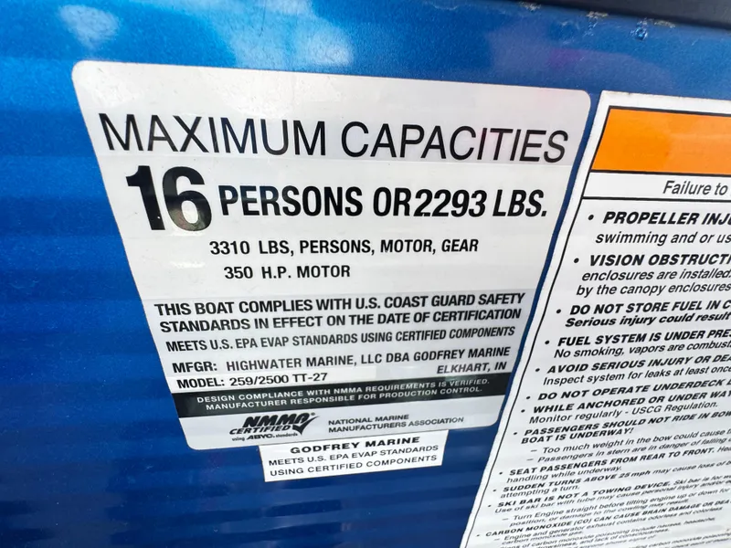 Slide: The Image of 2019 AquaPatio 259 DFL capacity label: 16 persons or 2293 lbs, 350 HP motor. - 16
