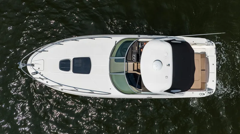 Slide: The Image of Aerial view of 2016 Sea Ray 310 Sundancer boat on water. - 13