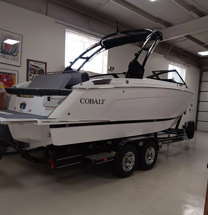 The Image of 2025 Cobalt R6 boat on trailer in indoor showroom setting. - 12