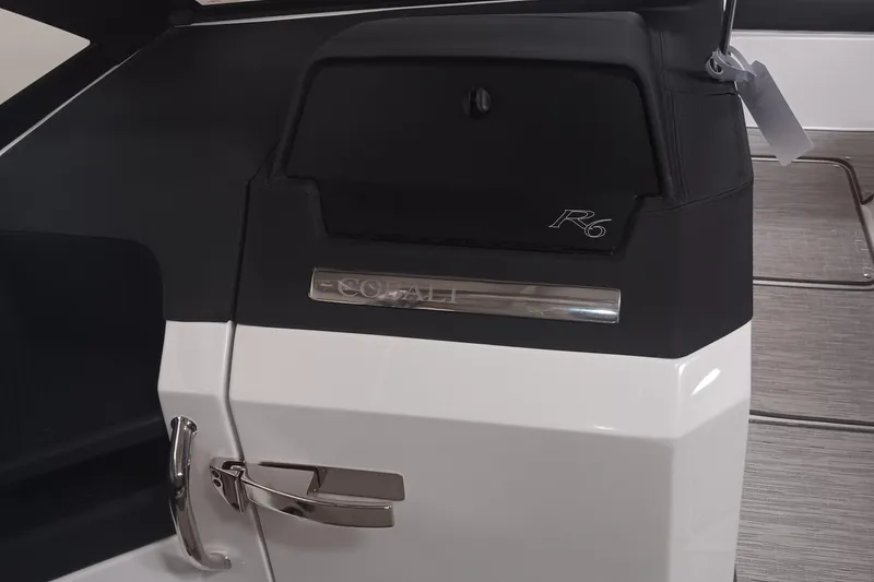 Slide: The Image of 2025 Cobalt R6 boat interior detail with sleek design and chrome accents. - 17