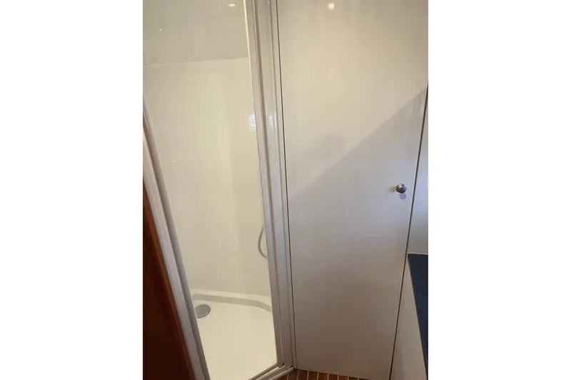 Slide: The Image of Shower area inside 2008 Elling E4 yacht, featuring sleek design and modern fixtures. - 17