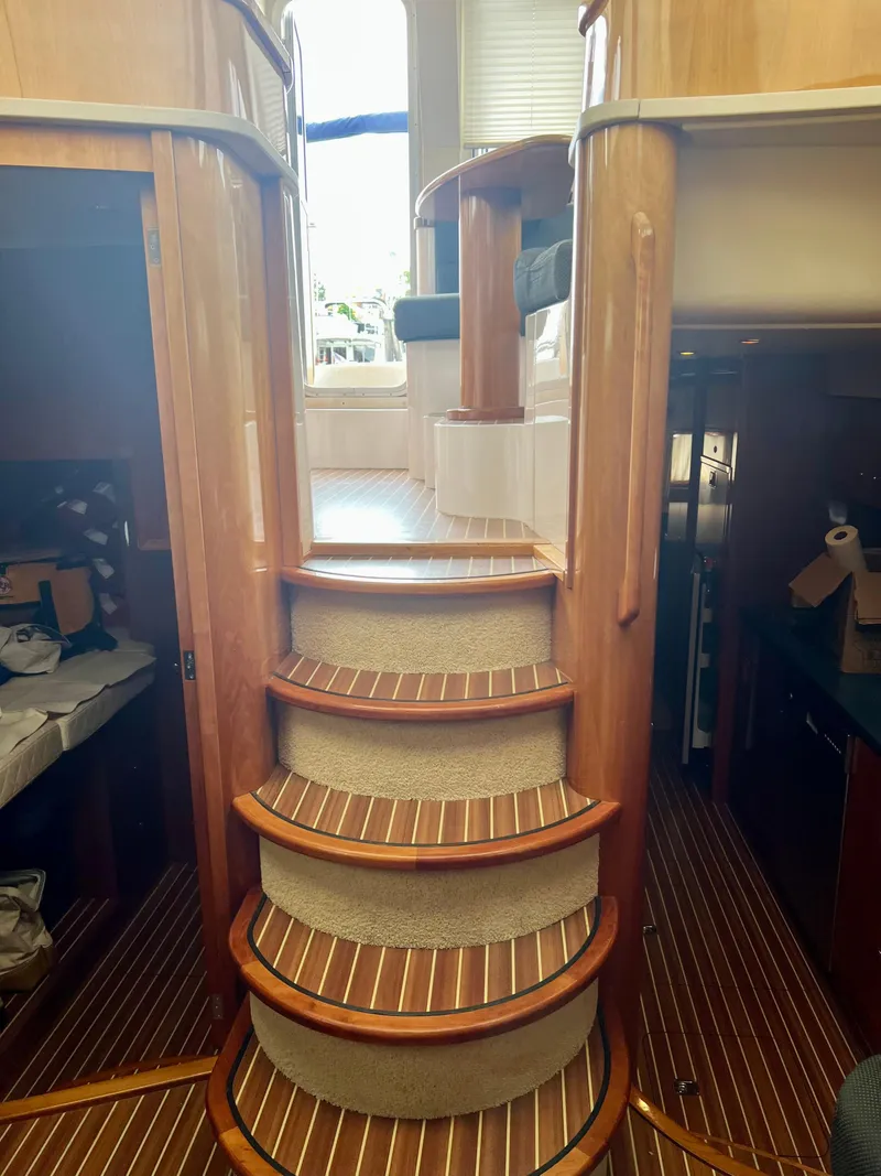 Slide: The Image of Interior of 2008 Elling E4 yacht with wooden stairs and elegant cabin design. - 5