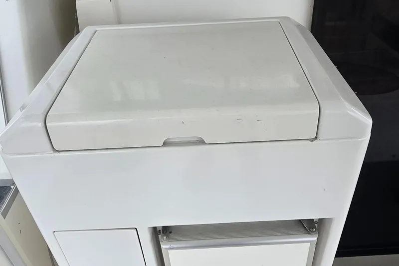 Slide: The Image of White storage compartment on a 2000 Carver 356 Aft Cabin Motor Yacht. - 10