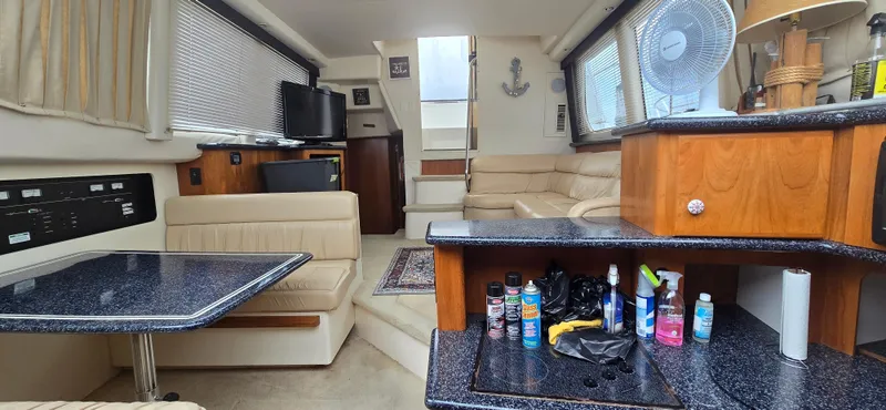 Slide: The Image of Interior of a 2000 Carver 356 Aft Cabin Motor Yacht with modern amenities. - 16