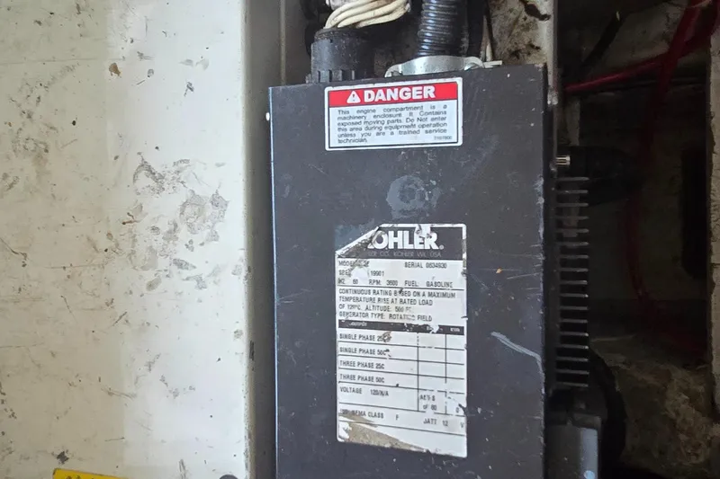 Slide: The Image of Electrical panel in a 2000 Carver 356 Aft Cabin Motor Yacht engine compartment. - 36