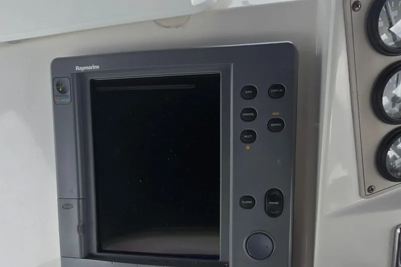 Slide: The Image of Raymarine navigation system on 2000 Carver 356 Aft Cabin Motor Yacht dashboard. - 6