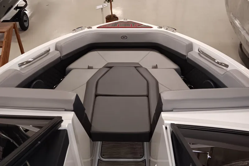 Slide: The Image of 2023 Cobalt R4 boat interior with sleek gray seating and modern design. - 13