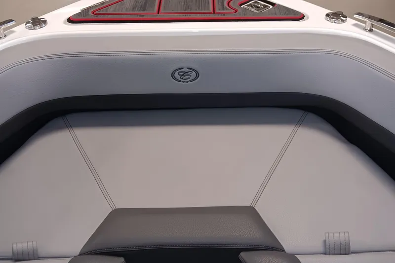 Slide: The Image of 2023 Cobalt R4 boat interior with sleek gray upholstery and modern design. - 20