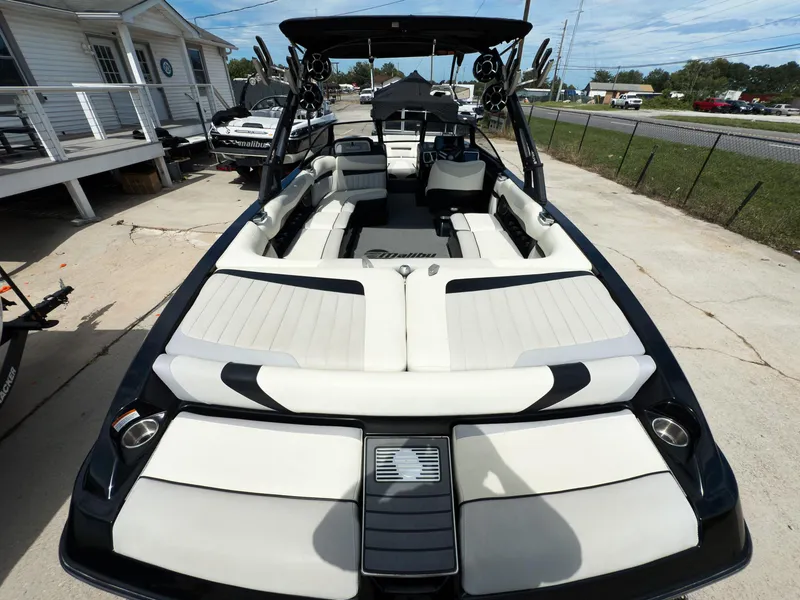 Slide: The Image of 2015 Malibu Wakesetter 24 MXZ boat with spacious seating and sleek design. - 11